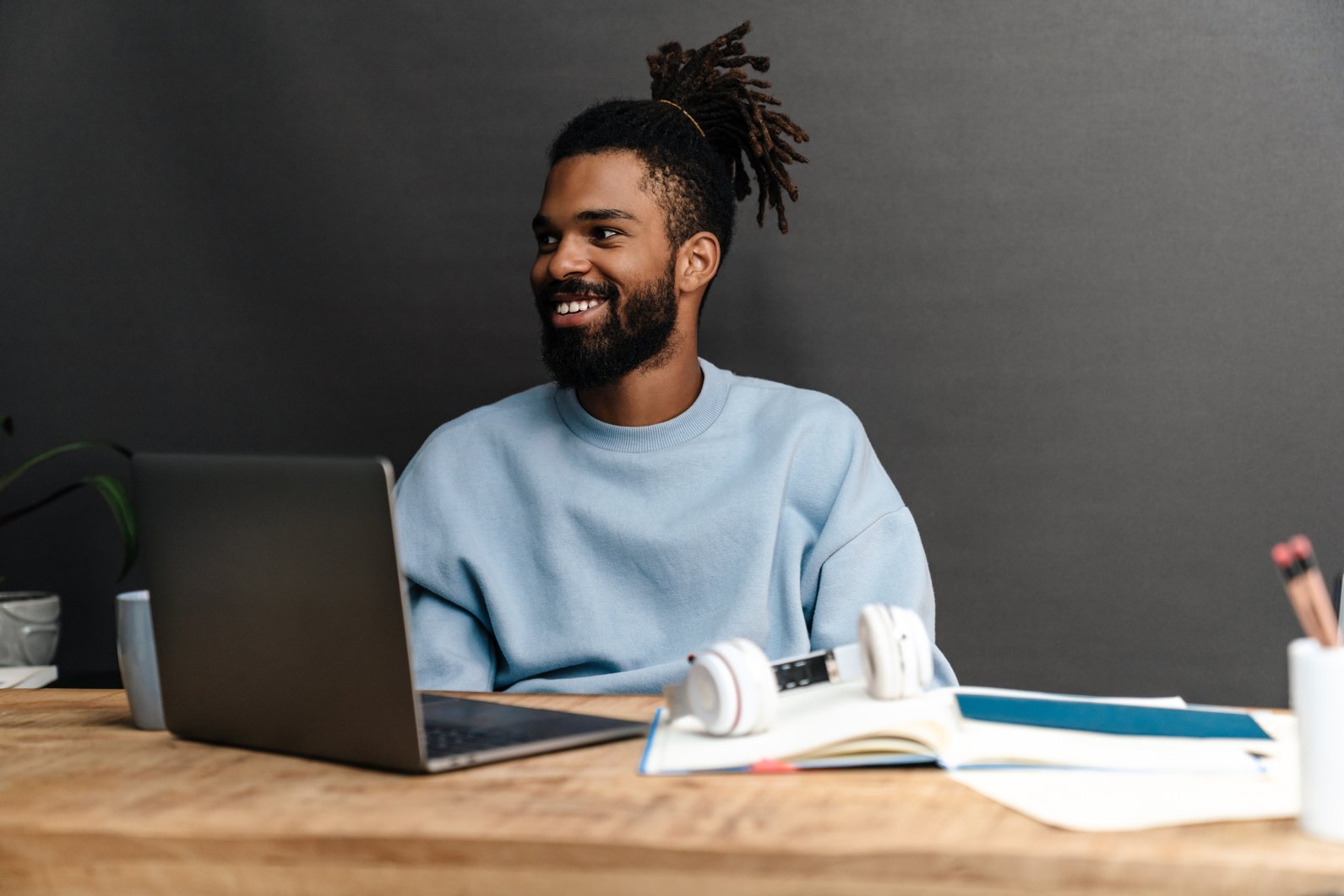 Confident Young African Man Freelancer Working